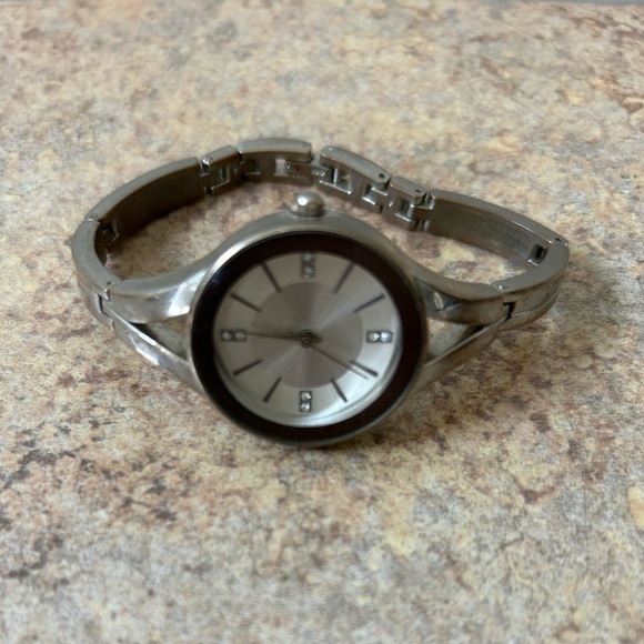 5/$25 Laura Scott silver bangle like watch. Cute and easy to wear. Pre-owned - Picture 6 of 6